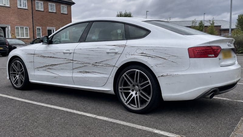 AI-generated totalled ride prank image by ViralPrank