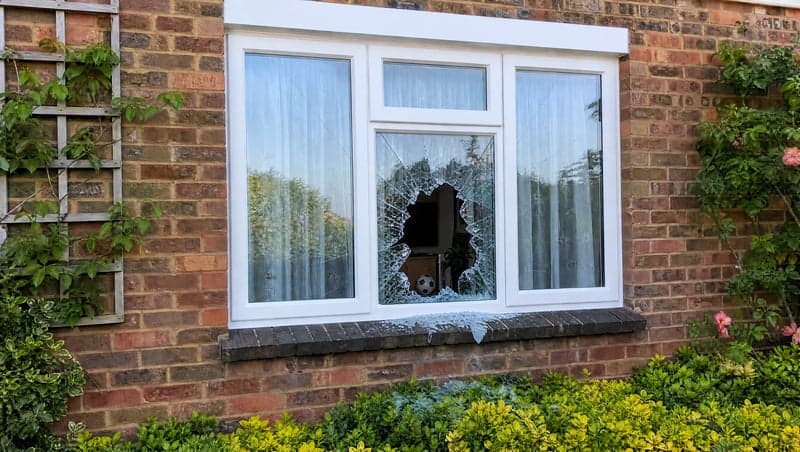AI-generated smashed window prank image by ViralPrank